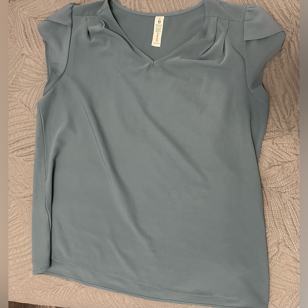 Blue top, perfect for work